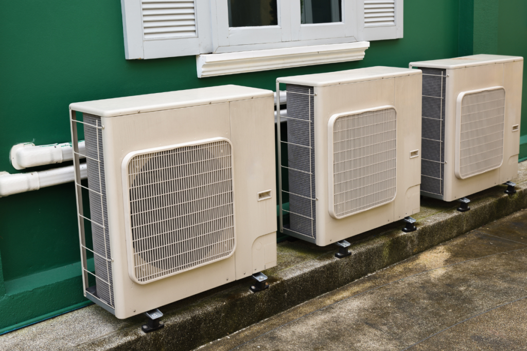 Multiple outdoor units of residential air conditioning Gold Coast systems installed at a home.