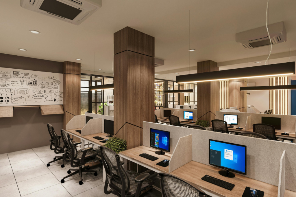 A contemporary corporate workspace with wooden desktop cubicles and ceiling cassette vents showcasing a premium commercial air conditioning installation gold coast project for an office building HVAC gold coast.