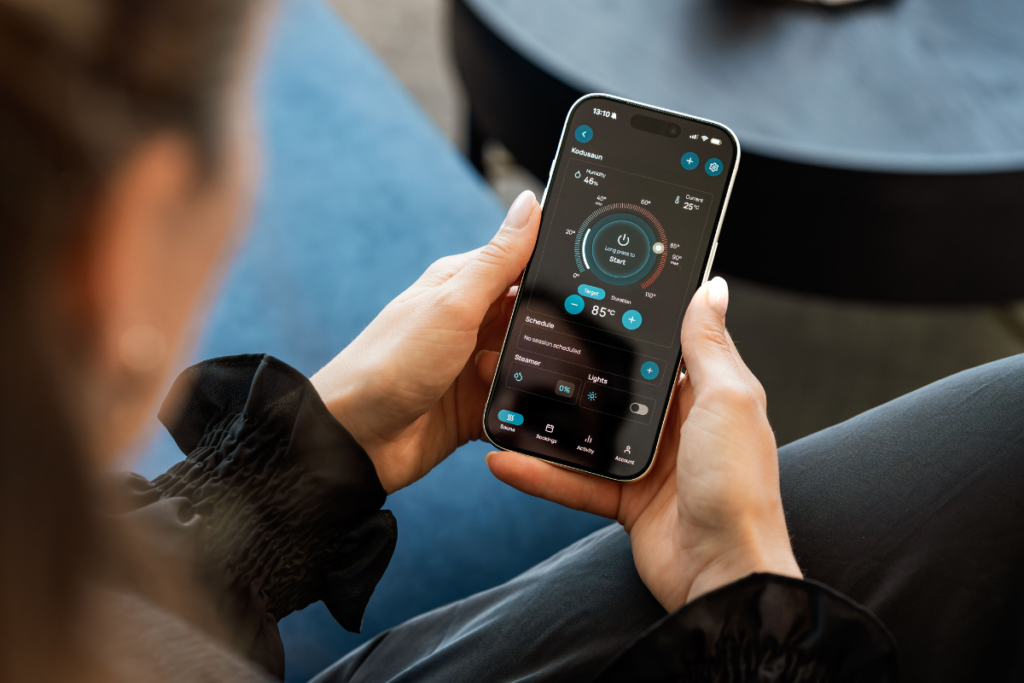 LG ThinQ app on a smartphone showing temperature and schedule controls for a WiFi split system