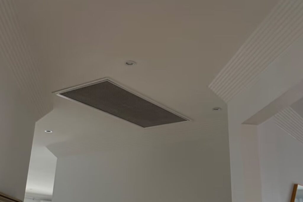 Ducted air conditioning installation Gold Coast: return-air vent in a Surfers Paradise living room ceiling