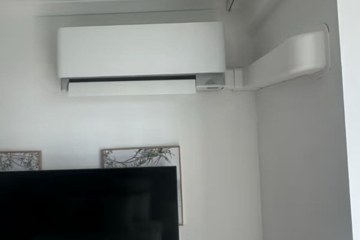 Two wall-mounted split systems in a Burleigh Heads living room — the best time to install air conditioning Gold Coast is winter