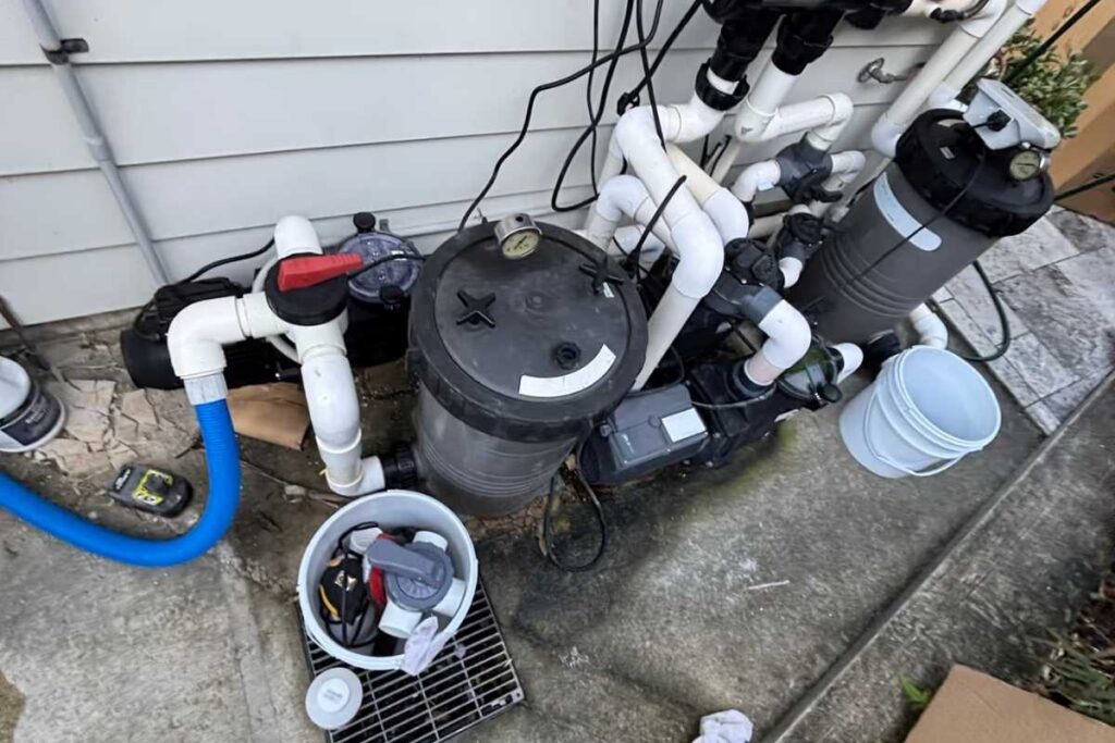 Rust and salt-air corrosion on an outdoor condenser — aircon faults caught during an air conditioning Gold Coast service
