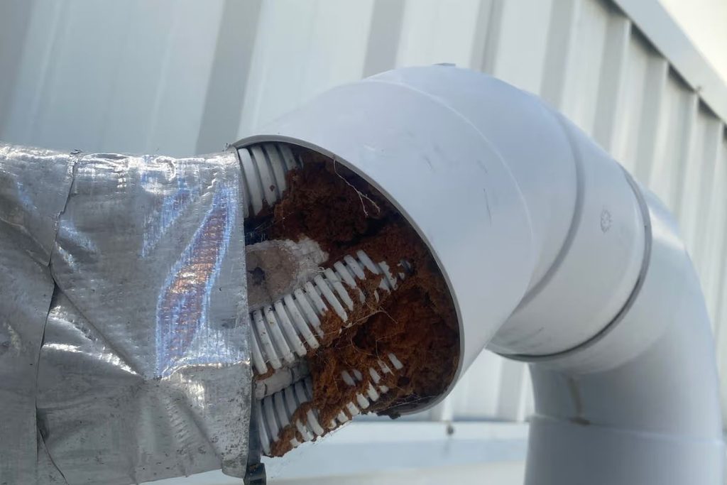 Corroded copper inside a rooftop air conditioning line-set — salt air air conditioning Gold Coast damage