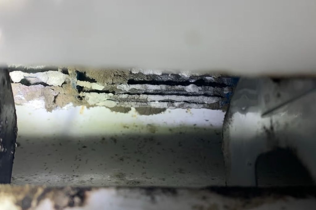 Dust and mould in air conditioner coil fins that only an air conditioning Gold Coast hydro clean can remove