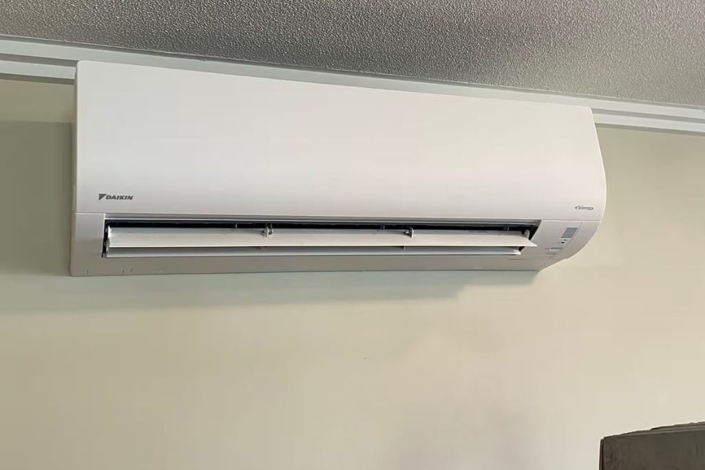 Daikin split system on a home wall during a leak inspection on the Gold Coast