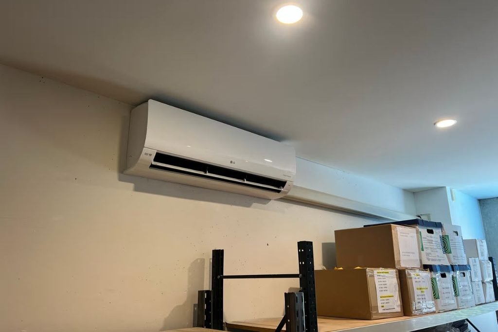 LG split system in a commercial storage room, checked for aircon leaking water inside