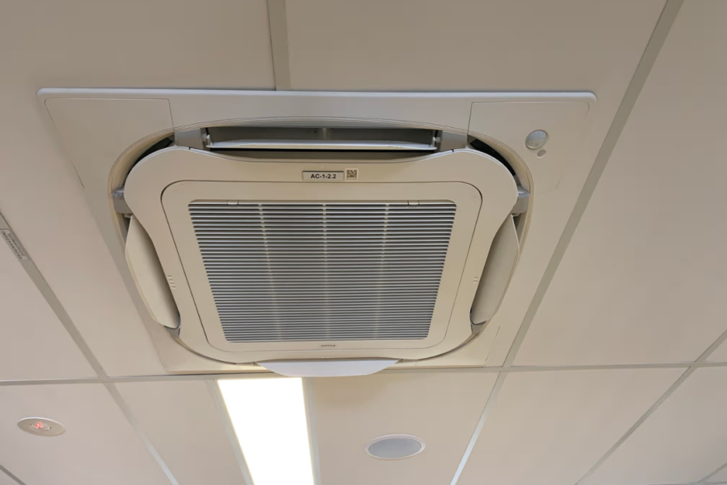 Ceiling cassette air conditioner in a Gold Coast office, keeping the workspace comfortable through spring temperature swings